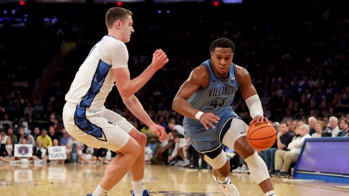 NCAA Basketball Villanova Wildcats forward Eric Dixon (43) drives to the basket against Creighton Bluejays center Ryan Kalkbrenner Brad Penner-USA TODAY Sports