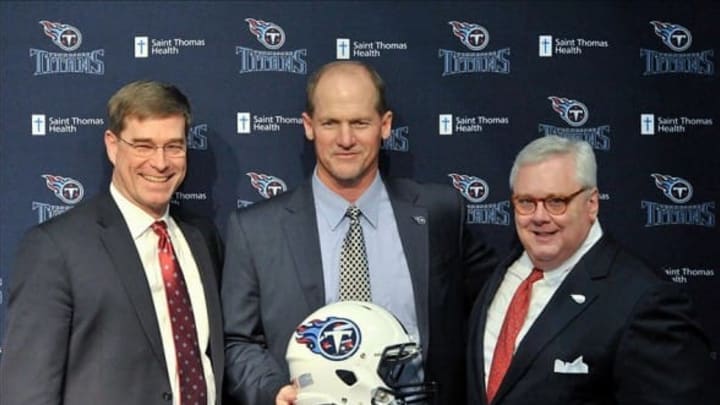 Jan 14, 2014; Nashville, TN, USA; Tennessee Titans new head coach Ken Whisenhunt (center) with general manager Ruston Webster (left) and president and ceo Tommy Smith (right) during the press conference at St. Thomas Sports Park. Mandatory Credit: Jim Brown-USA TODAY Sports