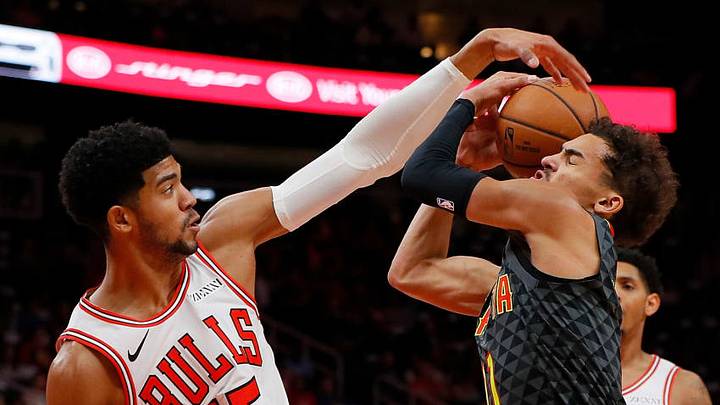 ATLANTA, GA - OCTOBER 27: Chandler Hutchison #15 of the Chicago Bulls defends against Trae Young #11 of the Atlanta Hawks at State Farm Arena on October 27, 2018 in Atlanta, Georgia. NOTE TO USER: User expressly acknowledges and agrees that, by downloading and or using this photograph, User is consenting to the terms and conditions of the Getty Images License Agreement. (Photo by Kevin C. Cox/Getty Images) ATLANTA, GA - OCTOBER 27: Chandler Hutchison #15 of the Chicago Bulls defends against Trae Young #11 of the Atlanta Hawks at State Farm Arena on October 27, 2018 in Atlanta, Georgia. NOTE TO USER: User expressly acknowledges and agrees that, by downloading and or using this photograph, User is consenting to the terms and conditions of the Getty Images License Agreement. (Photo by Kevin C. Cox/Getty Images)