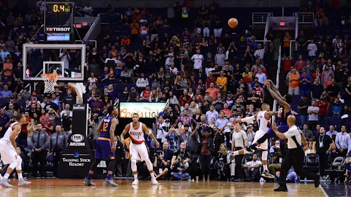 Nov 2, 2016; Phoenix, AZ, USA; Phoenix Suns guard Eric Bledsoe (2) makes the game winning three point basket in front of Portland Trail Blazers guard Damian Lillard (0) during overtime at Talking Stick Resort Arena. The Suns defeated the Trail Blazers 118-115. Mandatory Credit: Jennifer Stewart-USA TODAY Sports Nov 2, 2016; Phoenix, AZ, USA; Phoenix Suns guard Eric Bledsoe (2) makes the game winning three point basket in front of Portland Trail Blazers guard Damian Lillard (0) during overtime at Talking Stick Resort Arena. The Suns defeated the Trail Blazers 118-115. Mandatory Credit: Jennifer Stewart-USA TODAY Sports