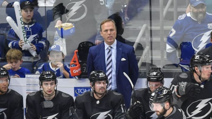 TAMPA, FL - MARCH 09: Tampa Bay Lightning Head Coach Jon Cooper during the first period of an NHL game between the Detroit Red Wings and the Tampa Bay Lightning on March 09, 2019 at Amalie Arena in Tampa, FL. (Photo by Roy K. Miller/Icon Sportswire via Getty Images)