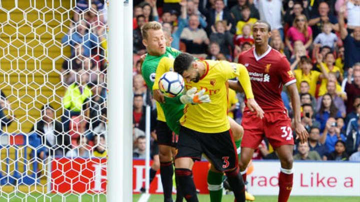 Player Ratings: Miguel Britos of Watford scores his sides third goal past Simon Mignolet of Liverpool during the Premier League match between Watford and Liverpool at Vicarage Road. (Tony Marshall for Getty Images)