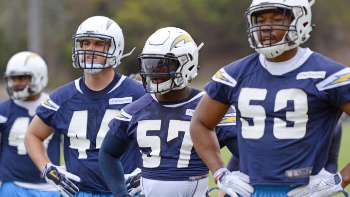 May 14, 2016; San Diego, CA, USA; San Diego Chargers linebacker Jatavis Brown (57) looks on during rookie mini camp next to Joshua Perry (53) at Charger Park. Mandatory Credit: Jake Roth-USA TODAY Sports