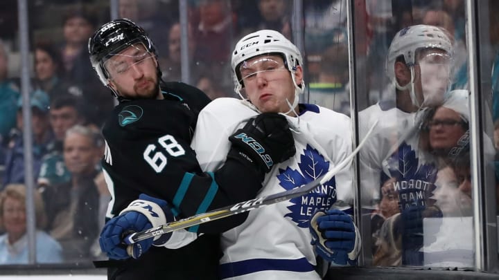 SAN JOSE, CA – NOVEMBER 15: Melker Karlsson #68 of the San Jose Sharks checks Travis Dermott #23 of the Toronto Maple Leafs at SAP Center on November 15, 2018 in San Jose, California. (Photo by Ezra Shaw/Getty Images)