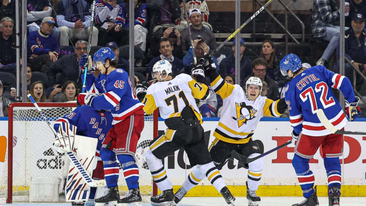 May 3, 2022; New York, New York, USA; Pittsburgh Penguins center Evgeni Malkin (71) reacts with left wing Brock McGinn (23) after scoring a goal past New York Rangers goaltender Igor Shesterkin (31) during the third overtime in game one of the first round of the 2022 Stanley Cup Playoffs at Madison Square Garden. Mandatory Credit: Vincent Carchietta-USA TODAY Sports
