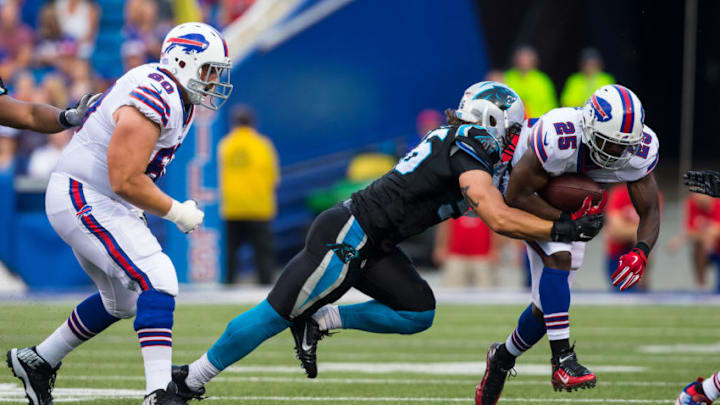 ORCHARD PARK, NY - AUGUST 14: A.J. Klein No. 56 of the Carolina Panthers tackles LeSean McCoy No. 25 of the Buffalo Bills during the first half on August 14, 2015 during a preseason game at Ralph Wilson Stadium in Orchard Park, New York. Carolina defeats Buffalo 25-24. (Photo by Brett Carlsen/Getty Images)