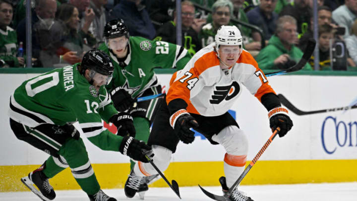 Apr 6, 2023; Dallas, Texas, USA; Dallas Stars center Ty Dellandrea (10) and Philadelphia Flyers right wing Owen Tippett (74) chase the puck at center ice during the third period at the American Airlines Center. Mandatory Credit: Jerome Miron-USA TODAY Sports