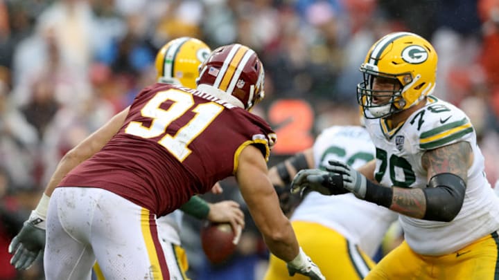 LANDOVER, MD - SEPTEMBER 23: Jason Spriggs #78 of the Green Bay Packers blocks Ryan Kerrigan #91 of the Washington Redskins at FedExField on September 23, 2018 in Landover, Maryland. (Photo by Rob Carr/Getty Images)