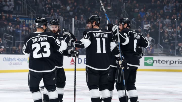 LOS ANGELES, CA – NOVEMBER 8: Dustin Brown #23, Drew Doughty #8, Anze Kopitar #11 and Jake Muzzin #6 of the Los Angeles Kings celebrate Muzzin’s first-period goal during the game against the Minnesota Wild at STAPLES Center on November 8, 2018 in Los Angeles, California. (Photo by Adam Pantozzi/NHLI via Getty Images)