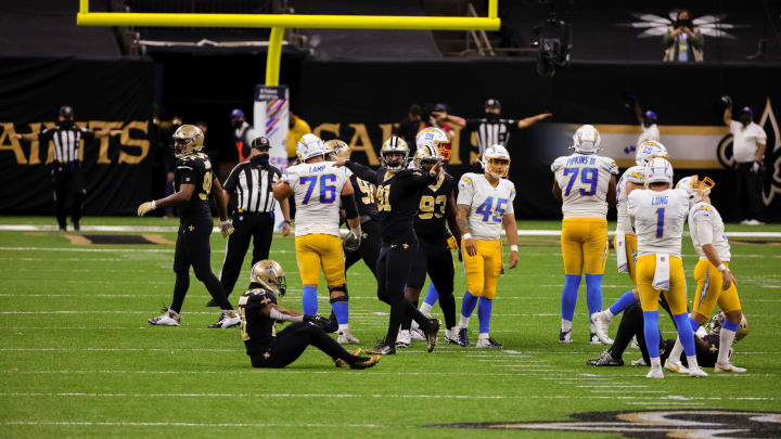 Oct 12, 2020; New Orleans, Louisiana, USA; Los Angeles Chargers place kicker Michael Badgley (right) misses on a field goal attempt against the New Orleans Saints at the end of regulation at the Mercedes-Benz Superdome. Mandatory Credit: Derick E. Hingle-USA TODAY Sports