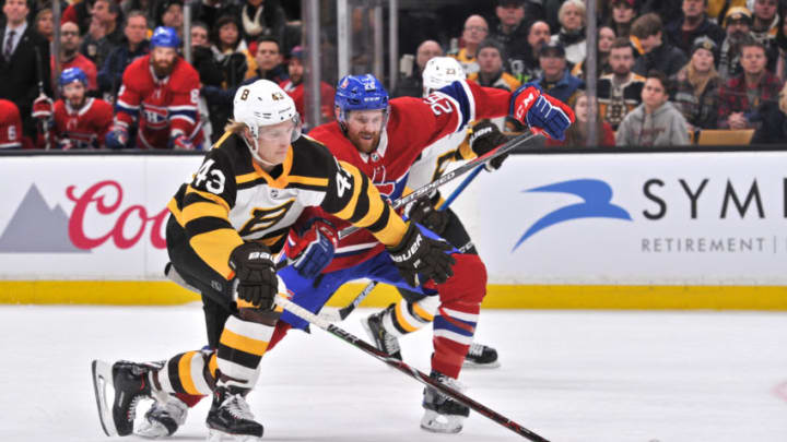 BOSTON, MA - JANUARY 14: Boston Bruins Left Wing Danton Heinen (43) battles Montreal Canadiens Defenceman Jeff Petry (26) for the loose puck. During the Boston Bruins game against the Montreal Canadiens on January 14, 2019 at TD Garden in Boston, MA. (Photo by Michael Tureski/Icon Sportswire via Getty Images)