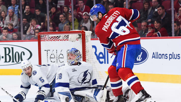 MONTREAL, QC - FEBRUARY 24: Tampa Bay Lightning Goalie Andrei Vasilevskiy (88) stops a shot from Montreal Canadiens Left Wing Max Pacioretty (67) during the Tampa Bay Lightning versus the Montreal Canadiens game on February 24, 2018, at Bell Centre in Montreal, QC (Photo by David Kirouac/Icon Sportswire via Getty Images)