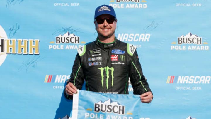 LOUDON, NH – JULY 20: Kurt Busch, driver of the #41 Monster Energy/Haas Automation Ford, poses with the Busch Pole Award after posting the fastest lap during qualifying for the Monster Energy NASCAR Cup Series Foxwoods Resort Casino 301 at New Hampshire Motor Speedway on July 20, 2018 in Loudon, New Hampshire. (Photo by Brian Lawdermilk/Getty Images)