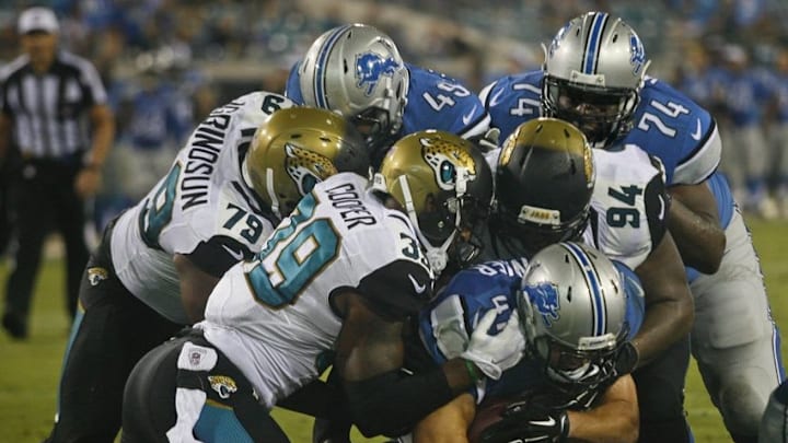 Aug 28, 2015; Jacksonville, FL, USA; Detroit Lions running back Zach Zenner (41) scores a touchdown in the fourth quarter of a preseason NFL football game against the Jacksonville Jaguars at EverBank Field. The Detroit Lions won 22-17. Mandatory Credit: Phil Sears-USA TODAY Sports