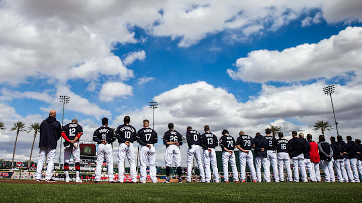 1GOODYEAR, AZ – FEBRUARY 23: Members of the Cleveland Indians stand for the National Anthem before a Spring Training Game at Goodyear Ballpark on February 23, 2018 in Goodyear, Arizona. (Photo by Rob Tringali/Getty Images)