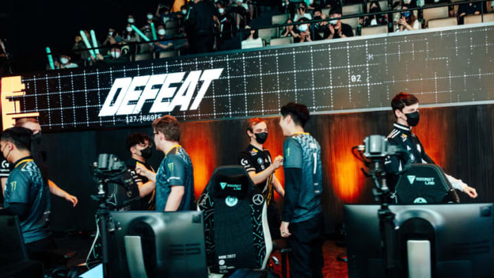 BUSAN, SOUTH KOREA - MAY 11: Teams Evil Geniuses and G2 Esports greet onstage after their match at the League of Legends - Mid-Season Invitational Groups Stage on May 11, 2022 in Busan, South Korea. (Photo by Colin Young-Wolff/Riot Games)