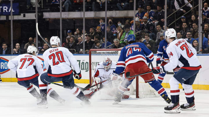 Feb 24, 2022; New York, New York, USA; Washington Capitals goaltender Ilya Samsonov (30) makes a save on a shot by New York Rangers center Morgan Barron (47) in front of right wing T.J. Oshie (77) and center Lars Eller (20) and center Connor McMichael (24) during the first period at Madison Square Garden. Mandatory Credit: Vincent Carchietta-USA TODAY Sports