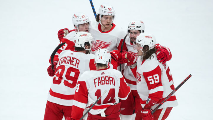 ST PAUL, MN - FEBRUARY 14: Members of the Detroit Red Wings celebrate after Robby Fabbri #14 scored a power play goal against the Minnesota Wild in the third period of the game at Xcel Energy Center on February 14, 2022 in St Paul, Minnesota. The Wild defeated the Red Wings 7-4. (Photo by David Berding/Getty Images)