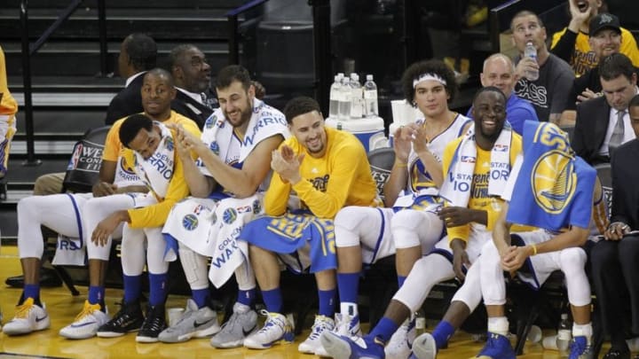 May 18, 2016; Oakland, CA, USA; The Golden State Warriors watch action from the bench against the Oklahoma City Thunder in the fourth quarter in game two of the Western conference finals of the NBA Playoffs at Oracle Arena. The Warriors defeated the Thunder 118-91. Mandatory Credit: Cary Edmondson-USA TODAY Sports