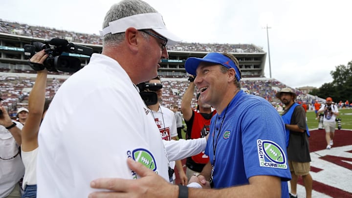 STARKVILLE, MS – SEPTEMBER 29: Head coach Joe Moorhead of the Mississippi State Bulldogs and head coach Dan Mullen of the Florida Gators greet each other before a game at Davis Wade Stadium on September 29, 2018 in Starkville, Mississippi. (Photo by Jonathan Bachman/Getty Images)