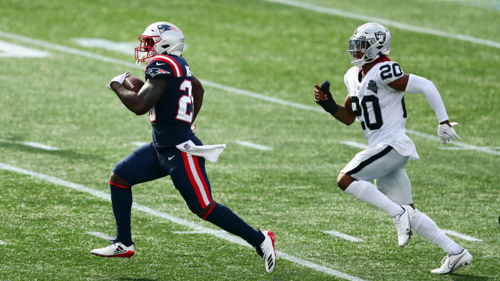 Sony Michel #26 of the New England Patriots runs with the ball during the second half against the Las Vegas Raiders (Photo by Adam Glanzman/Getty Images)