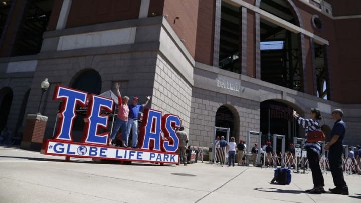 Apr 4, 2016; Arlington, TX, USA; Fans pose outside the stadium before the game between the Texas Rangers and the Seattle Mariners at Globe Life Park in Arlington. Mandatory Credit: Tim Heitman-USA TODAY Sports