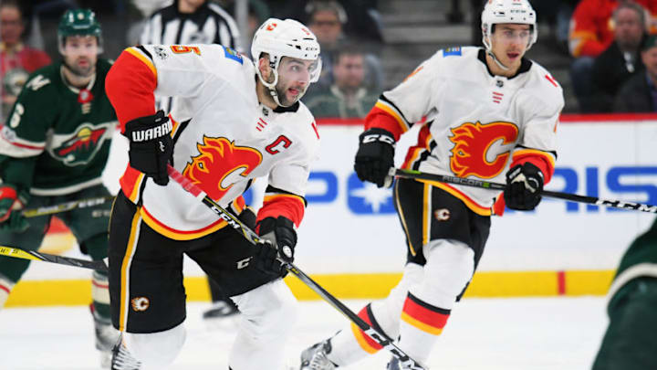 MINNEAPOLIS, MN - DECEMBER 12: Calgary Flames Defenceman Mark Giordano (5) skates with the puck during a NHL game between the Minnesota Wild and Calgary Flames on December 12, 2017 at Xcel Energy Center in St. Paul, MN.The Wild defeated the Flames 2-1 in a shootout.(Photo by Nick Wosika/Icon Sportswire via Getty Images)