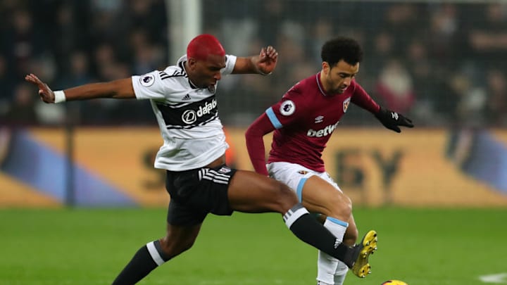 LONDON, ENGLAND - FEBRUARY 22: Felipe Anderson of West Ham United holds off Ryan Babel of Fulham during the Premier League match between West Ham United and Fulham FC at the London Stadium on February 22, 2019 in London, United Kingdom. (Photo by Catherine Ivill/Getty Images)