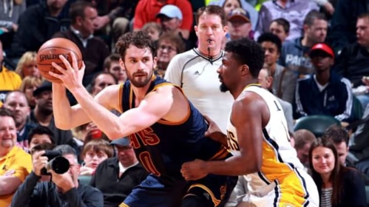 Apr 6, 2016; Indianapolis, IN, USA; Cleveland Cavaliers forward Kevin Love (0) is guarded by Indiana Pacers forward Solomon Hill (44) during the first quarter at Bankers Life Fieldhouse. Mandatory Credit: Brian Spurlock-USA TODAY Sports