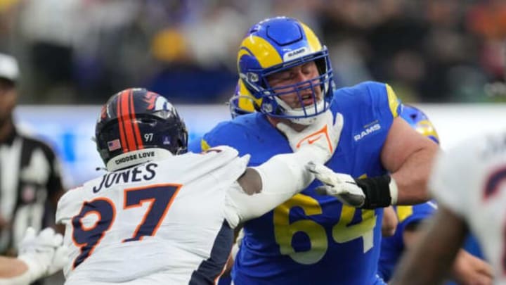 Dec 25, 2022; Inglewood, California, USA; Los Angeles Rams center Matt Skura (64) defends against Denver Broncos defensive tackle D.J. Jones (97) in the second half at SoFi Stadium. Mandatory Credit: Kirby Lee-USA TODAY Sports