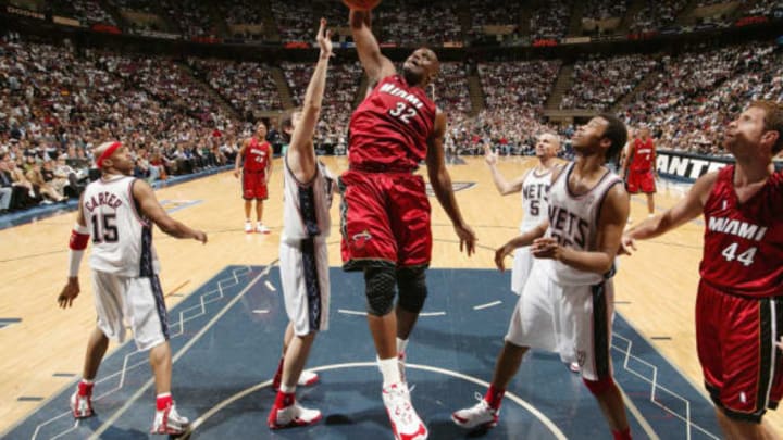 EAST RUTHERFORD, NJ – APRIL 28: Shaquille O’Neal #32 of the Miami Heat dunks against the New Jersey Nets during Game 3 of the Eastern Conference Quarterfinals on April 28, 2005 at the Continental Airlines Arena in East Rutherford, New Jersey. The Heat won 108-105 in double overtime to take a 3-0 series lead. NOTE TO USER: User expressly acknowledges and agrees that, by downloading and or using this photograph, User is consenting to the terms and conditions of the Getty Images License Agreement. Mandatory Copyright Notice: Copyright 2005 NBAE (Photo by Jesse D. Garrabrant/NBAE via Getty Images) *** Local Caption *** Shaquille O’Neal