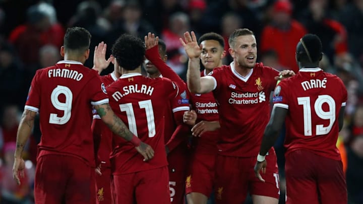 LIVERPOOL, ENGLAND - APRIL 24: Sadio Mane of Liverpool (19) celebrates after scoring his sides third goal with team mates during the UEFA Champions League Semi Final First Leg match between Liverpool and A.S. Roma at Anfield on April 24, 2018 in Liverpool, United Kingdom. (Photo by Clive Brunskill/Getty Images)
