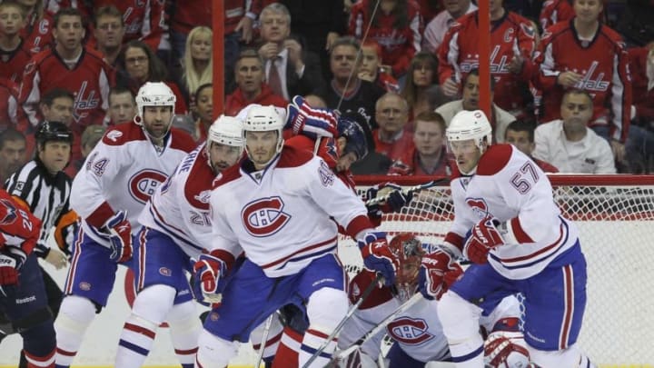WASHINGTON - APRIL 28: (L-R) Roman Hamrlik, Ryan O'Byrne #20, Maxim Lapierre #40, Jaroslav Halak #41 and Benoit Pouliot #57 of the Montreal Canadiens defend the net against the Washington Capitals in Game Seven of the Eastern Conference Quarterfinals during the 2010 NHL Stanley Cup Playoffs at the Verizon Center on April 28, 2010 in Washington, DC. The Canadiens defeated the Capitals 2-1 to win the series. (Photo by Bruce Bennett/Getty Images)