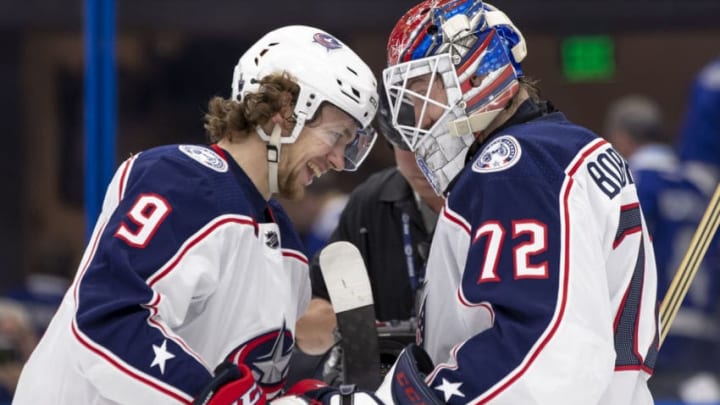 TAMPA, FL - APRIL 10: Columbus Blue Jackets goaltender Sergei Bobrovsky (72) and Columbus Blue Jackets left wing Artemi Panarin (9) celebrate the upset win during the Stanley Cup Playoffs between the Lightning and Columbus on April 10, 2019 at Amalie Arena in Tampa, FL. (Photo by Andrew Bershaw/Icon Sportswire via Getty Images)