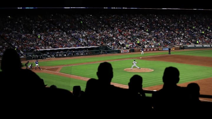 ARLINGTON, TX - MAY 22: A.J. Cole #67 of the New York Yankees pitchs to Ronald Guzman #67 of the Texas Rangers at Globe Life Park in Arlington on May 22, 2018 in Arlington, Texas. (Photo by Ronald Martinez/Getty Images)