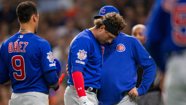 HOUSTON, TX - MAY 29: Chicago Cubs center fielder Albert Almora Jr. (5) reacts with Chicago Cubs manager Joe Maddon (70) as a child was hit in the face by a foul ball hit by Albert Almora in the fourth inning of a baseball game between the Houston Astros and the Chicago Cubs during a MLB baseball game at Minute Maid Park in May 29, 2019, in Houston, TX. (Photo by Juan DeLeon/Icon Sportswire via Getty Images)