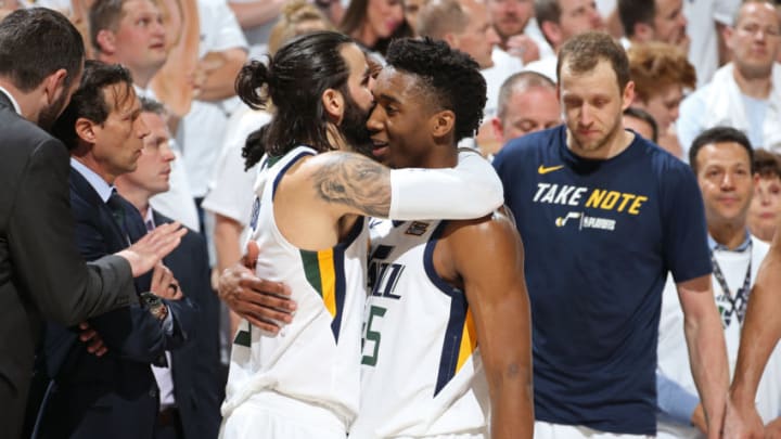 SALT LAKE CITY, UT - APRIL 23: Ricky Rubio #3 and Donovan Mitchell #45 of the Utah Jazz hug after Game Four of Round One of the 2018 NBA Playoffs against the Oklahoma City Thunder on April 23, 2018 at vivint.SmartHome Arena in Salt Lake City, Utah. NOTE TO USER: User expressly acknowledges and agrees that, by downloading and or using this Photograph, User is consenting to the terms and conditions of the Getty Images License Agreement. Mandatory Copyright Notice: Copyright 2018 NBAE (Photo by Melissa Majchrzak/NBAE via Getty Images)