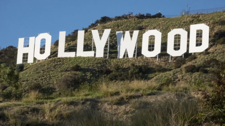 LOS ANGELES, CALIFORNIA - DECEMBER 15: Tourists hike to the Hollywood sign on December 15, 2019, in Los Angeles, California. Originally created in 1923 as a temporary advertisement for a local real estate development, the Hollywood sign has become an American landmark and cultural icon. (Photo by Paul Rovere/Getty Images)