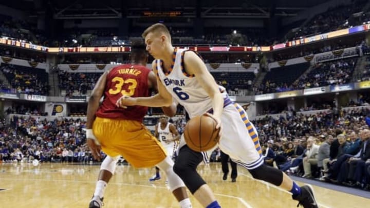 Feb 24, 2016; Indianapolis, IN, USA; New York Knicks center Kirstaps Porzingis (6) drives to the basket against Indiana Pacers center Myles Turner (33) at Bankers Life Fieldhouse. Indiana defeats New York 108-105. Mandatory Credit: Brian Spurlock-USA TODAY Sports