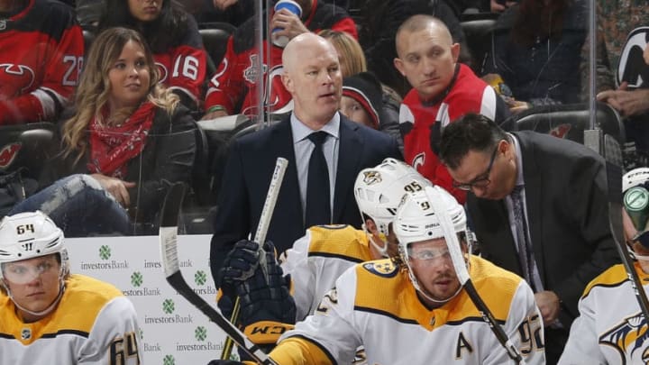 NEWARK, NJ - JANUARY 30: Former Head Coach of the New Jersey Devils, John Hynes now Head Coach of the Nashville Predators, looks on from behind the bench during the game at the Prudential Center on January 30, 2020 in Newark, New Jersey. (Photo by Andy Marlin/NHLI via Getty Images)