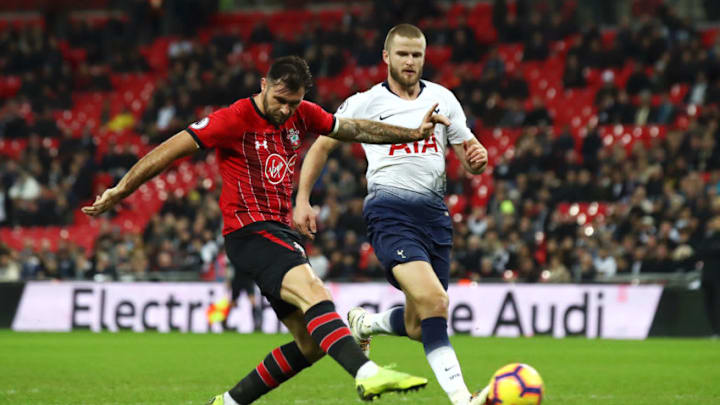 LONDON, ENGLAND - DECEMBER 05: Charlie Austin of Southampton scores his team's first goal under pressure from Eric Dier of Tottenham Hotspur during the Premier League match between Tottenham Hotspur and Southampton FC at Wembley Stadium on December 5, 2018 in London, United Kingdom. (Photo by Julian Finney/Getty Images)
