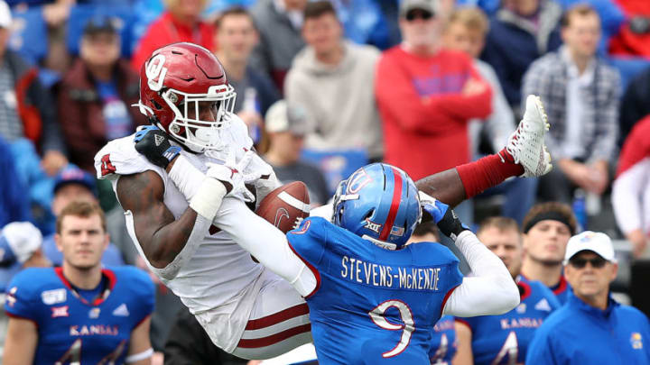 LAWRENCE, KANSAS - OCTOBER 05: Linebacker Najee Stevens-McKenzie #9 of the Kansas Jayhawks breaks up a pass intended for running back Trey Sermon #4 of the Oklahoma Sooners during the game at Memorial Stadium on October 05, 2019 in Lawrence, Kansas. Stevens-McKenzie intercepted the pass on the play. (Photo by Jamie Squire/Getty Images)