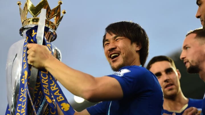LEICESTER, ENGLAND - MAY 07: Shinji Okazaki of Leicester City celebrates the season champions with the Premier League Trophy after the Barclays Premier League match between Leicester City and Everton at The King Power Stadium on May 7, 2016 in Leicester, United Kingdom. (Photo by Laurence Griffiths/Getty Images)