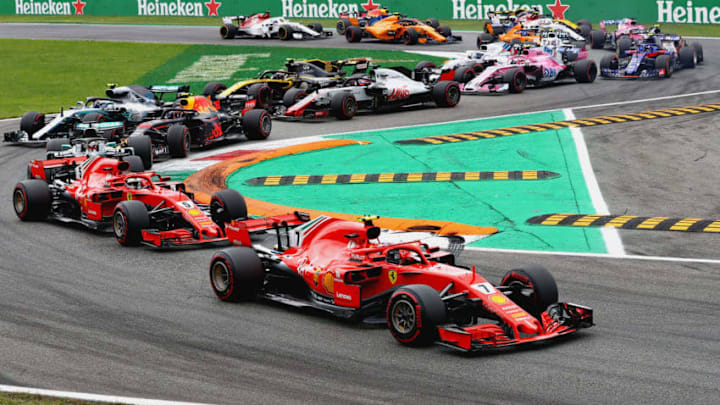 MONZA, ITALY - SEPTEMBER 02: Kimi Raikkonen of Finland driving the (7) Scuderia Ferrari SF71H leads Sebastian Vettel of Germany driving the (5) Scuderia Ferrari SF71H and the rest of the field at the start during the Formula One Grand Prix of Italy at Autodromo di Monza on September 2, 2018 in Monza, Italy. (Photo by Mark Thompson/Getty Images)