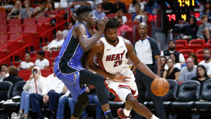 MIAMI, FL – OCTOBER 08: Justise Winslow #20 of the Miami Heat drives to the basket against Mohamed Bamba #5 of the Orlando Magic during the second half at American Airlines Arena on October 8, 2018 in Miami, Florida. NOTE TO USER: User expressly acknowledges and agrees that, by downloading and or using this photograph, User is consenting to the terms and conditions of the Getty Images License Agreement. (Photo by Michael Reaves/Getty Images)