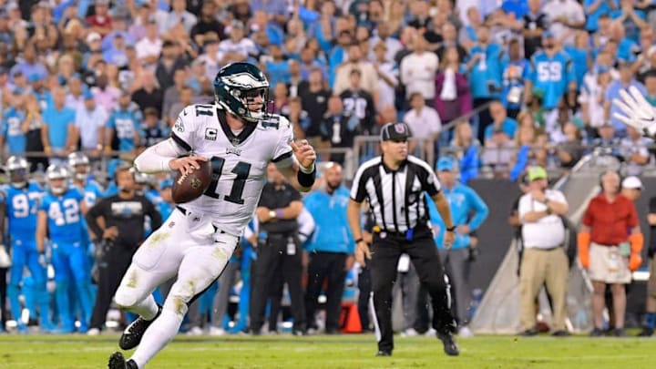 CHARLOTTE, NC - OCTOBER 12: Carson Wentz #11 of the Philadelphia Eagles runs the ball against the Carolina Panthers in the second quarter during their game at Bank of America Stadium on October 12, 2017 in Charlotte, North Carolina. (Photo by Grant Halverson/Getty Images)