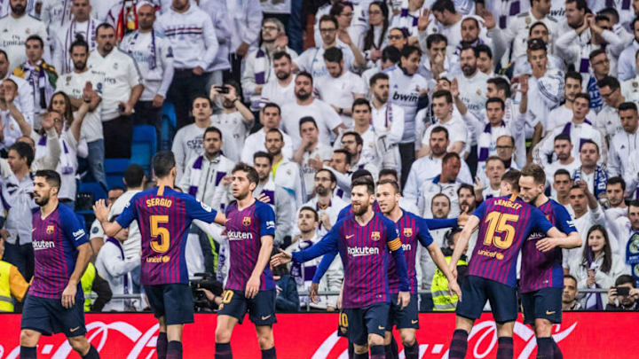 MADRID, SPAIN - MARCH 02: Ivan Rakitic of Barcelona celebrates after scoring his team's first goal with team mates during the La Liga match between Real Madrid CF and FC Barcelona at Estadio Santiago Bernabeu on March 2, 2019 in Madrid, Spain. (Photo by TF-Images/Getty Images)