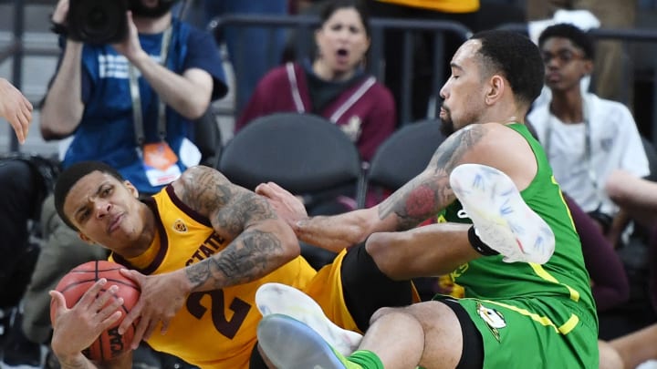 LAS VEGAS, NEVADA – MARCH 15: Rob Edwards #2 of the Arizona State Sun Devils grabs a loose ball against Paul White #13 of the Oregon Ducks during a semifinal game of the Pac-12 basketball tournament at T-Mobile Arena on March 15, 2019 in Las Vegas, Nevada. The Ducks defeated the Sun Devils 79-75 in overtime. (Photo by Ethan Miller/Getty Images)