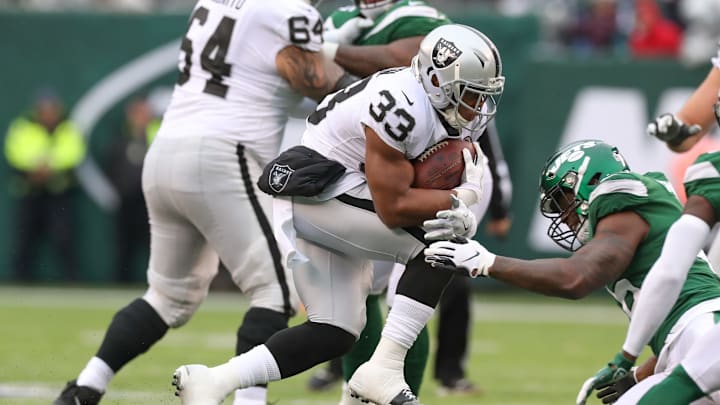 EAST RUTHERFORD, NJ – NOVEMBER 24: Oakland Raiders running back DeAndre Washington (33) runs during the National Football League game between the New York Jets and the Oakland Raiders on November 24, 2019 at MetLife Stadium in East Rutherford, NJ. (Photo by Rich Graessle/Icon Sportswire via Getty Images)