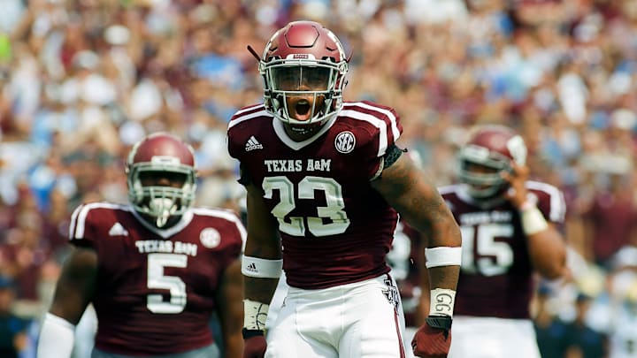 Sep 3, 2016; College Station, TX, USA; Texas A&M Aggies defensive back Armani Watts (23) reacts to a tackle against the UCLA Bruins during a game at Kyle Field. Texas A&M won in overtime 31-24. Mandatory Credit: Ray Carlin-USA TODAY Sports